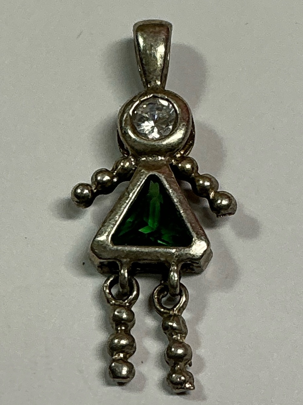 Sterling Silver Little Girl Pendant with Articulating Legs & Green Stone.